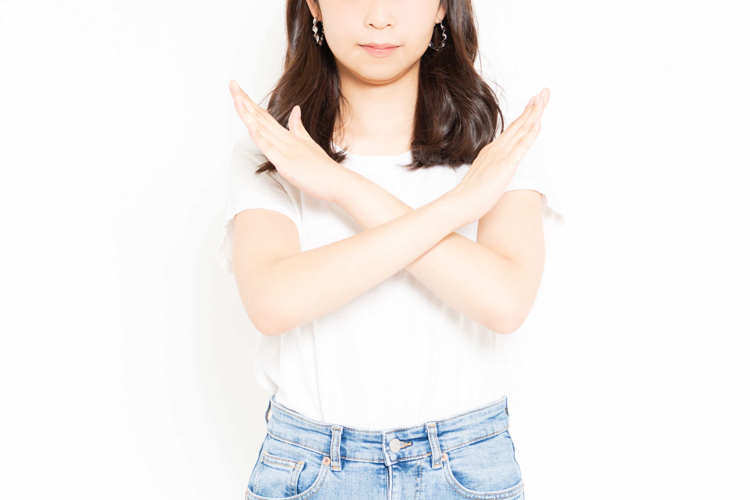 NGサインをする女性